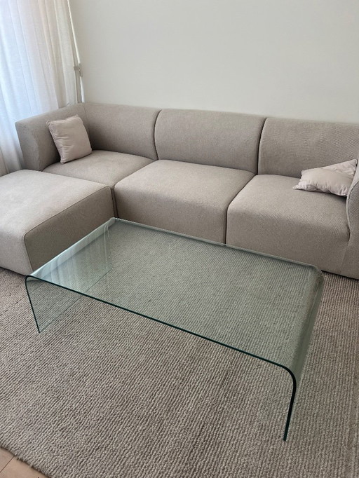 Glass curved coffee table