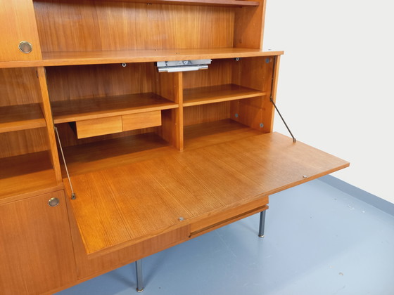 Image 1 of Louis Paolozzi's vintage modernist secretary bookcase for Monopoly in teak and metal from the 60s
