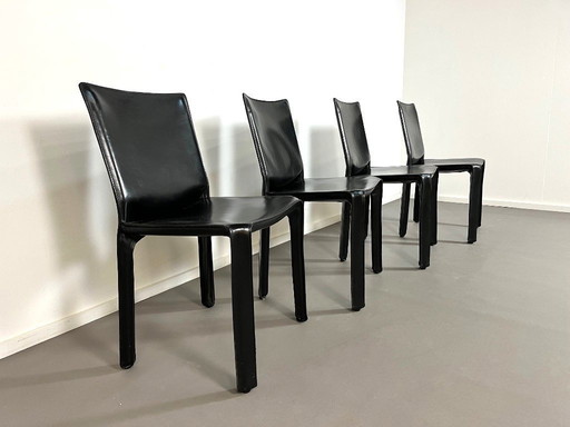4 Black leather CAB 412 dining chairs by Mario Bellini for Cassina, 1980s.