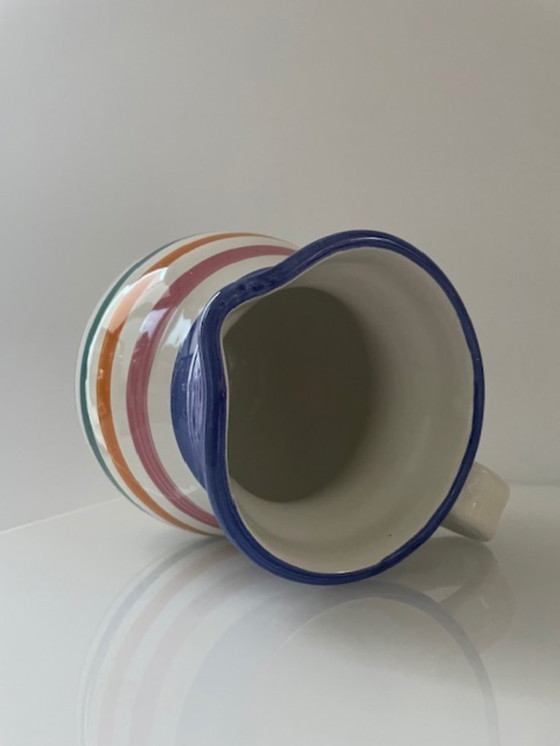 Image 1 of Handgemaakte vintage schenkkan met kleurrijke strepen