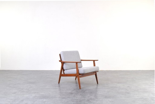 Sillón danés de teca de mediados de siglo, década de 1960.