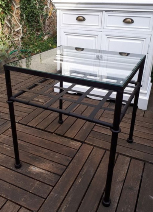 Square side table in glass and black metal
