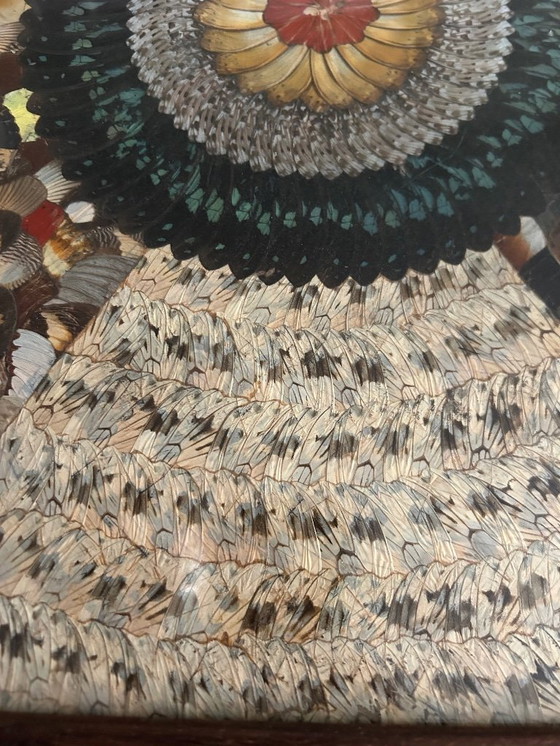 Image 1 of vassoio in legno decorato con ali di farfalla