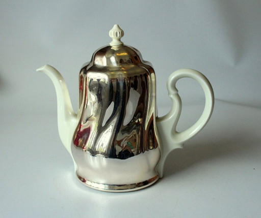 Caffettiera HKE in porcellana di alta qualità con coperchio scaldavivande in metallo argentato.