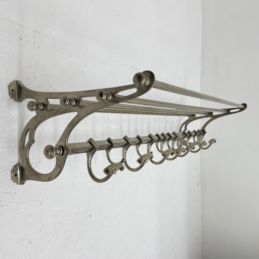 Metal coat rack with hat shelf and hooks