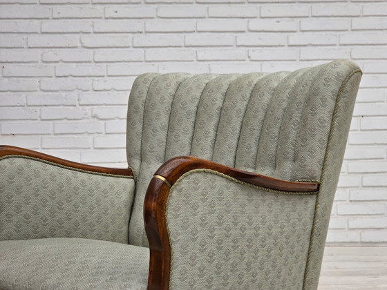 Image 1 of Deense fauteuil uit de jaren 60, lichtblauwe meubelstof, beukenhout.