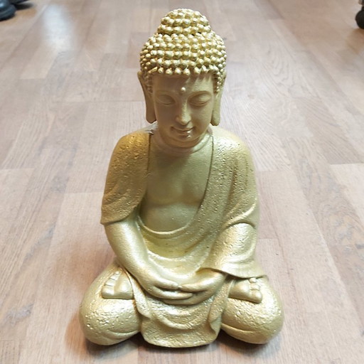 Buddha golden in resin