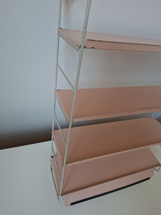 Image 1 of Raro estante de pared con la marca Tomado Holland