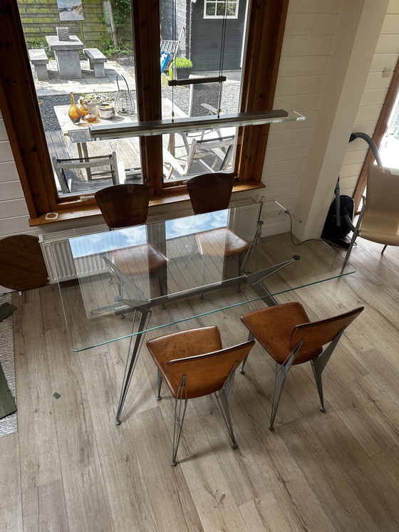 Image 1 of Table de salle à manger design avec 4 chaises en cuir assorties