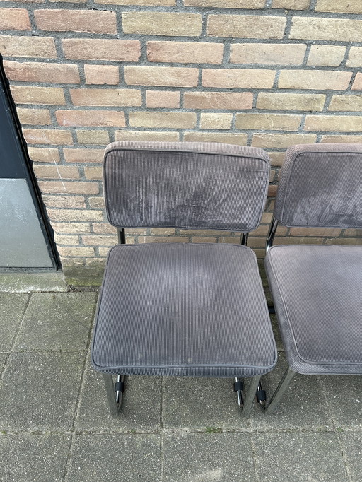 4x Chaises en tissu strié avec structure tubulaire chromée
