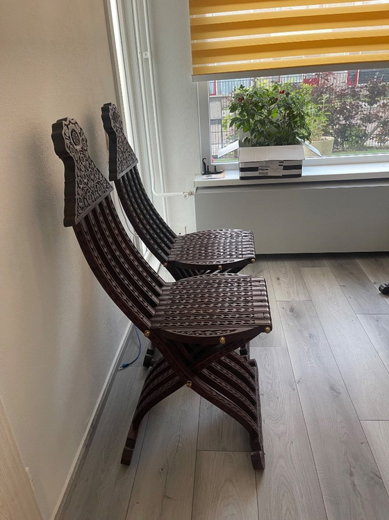 Image 1 of Pakistani Chiniot hand-carved rosewood chairs with Savonarola-inspired folding form