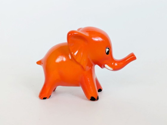 Image 1 of Goebel West Germany Elephant Pair Tangerine Orange Porcelain 1970s MCM Figurines