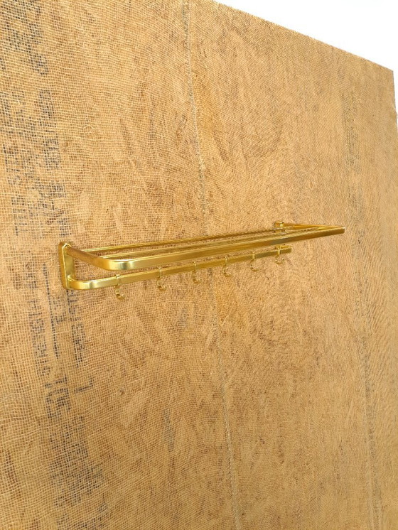 Image 1 of Porte-manteau en forme de train, couleur or, avec crochets, n° 18