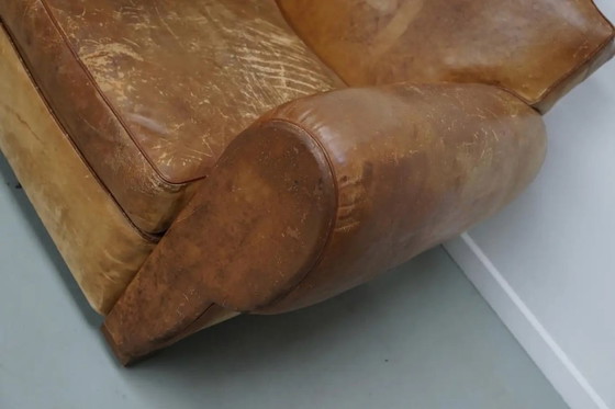 Image 1 of Ein Paar französischer cognacfarbener Ledersessel mit schnurrbartförmigen Rückenlehnen, 1940er Jahre