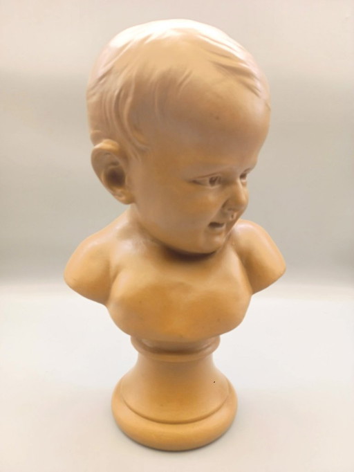 Buste enfant en terre cuite