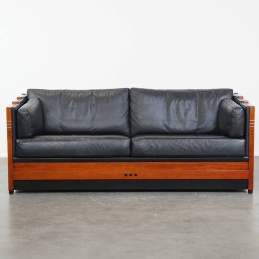 Sofá de diseño Art Déco Schuitema de 2,5 plazas modelo Baldwin de la serie Decoforma con tapas abatibles