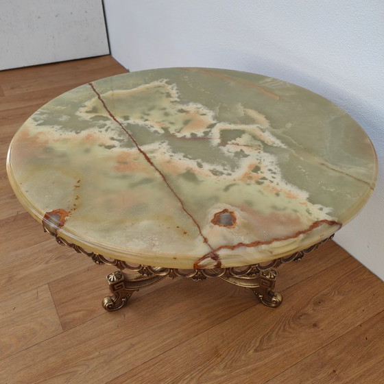 Image 1 of Vintage round Regency coffee table with marble top and brass base