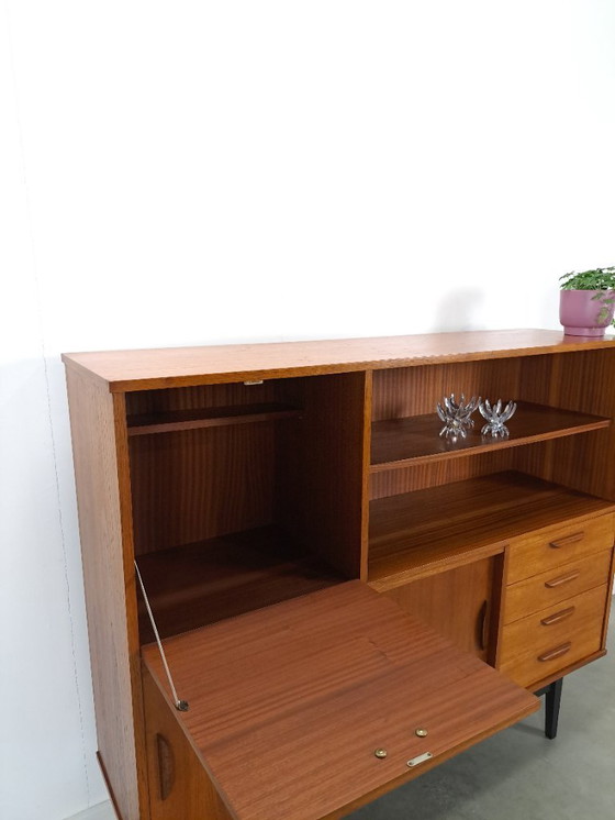 Image 1 of Armario de pared de teca con cajones, barra y patas negras