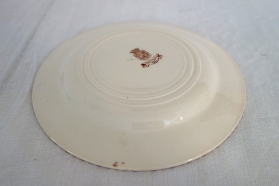 Image 1 of 11 assiettes plates Terre De Fer Gien modèle Mai vers 1900