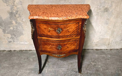 Louis XV style chest of drawers in rosewood marquetry, 20th century