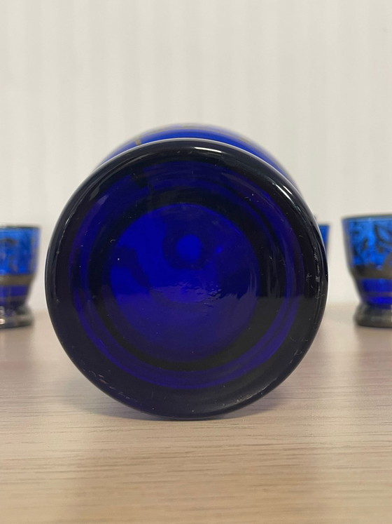 Image 1 of Rosolio-fles: 1 fles en 12 met zilver versierde glazen.