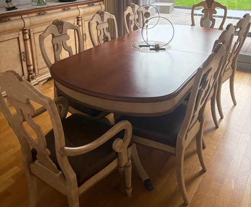 Magnifique ensemble de salle à manger artisanal en bois véritable, comprenant 8 chaises revêtues de cuir véritable.