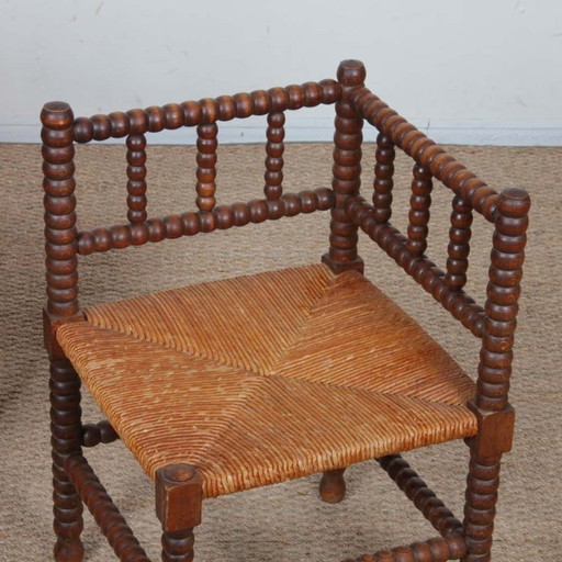 Pair of small turned wood corner chairs with straw seats, 1940