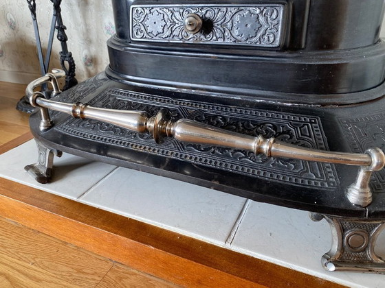 Image 1 of Antique cast iron stove with hearth set and bellows