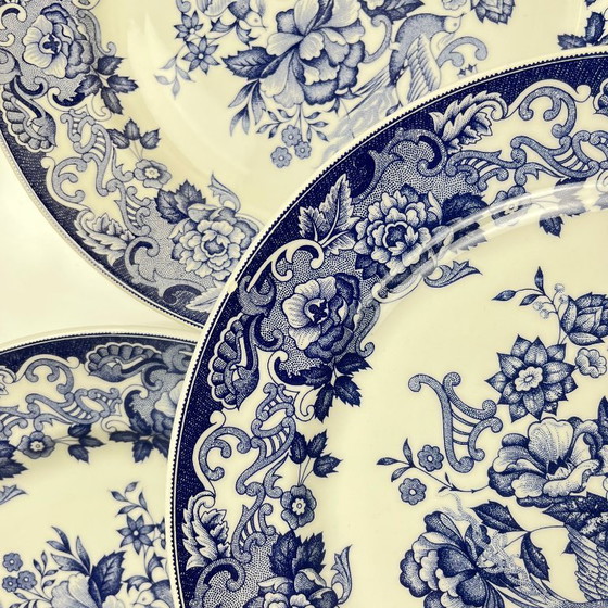Image 1 of Set of 8 blue earthenware dinner plates with floral and bird decoration, early 20th century