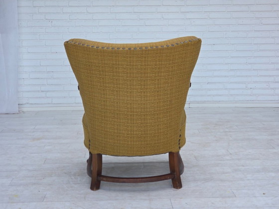 Image 1 of Deense fauteuil uit de jaren 60, originele groene meubelwol, gesneden eikenhout