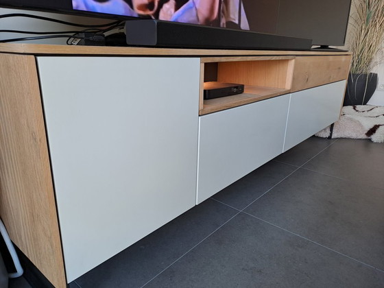 Image 1 of Ensemble XOOON Darwin : buffet, meuble TV, table et chaises, table basse, table à manger et fauteuil.