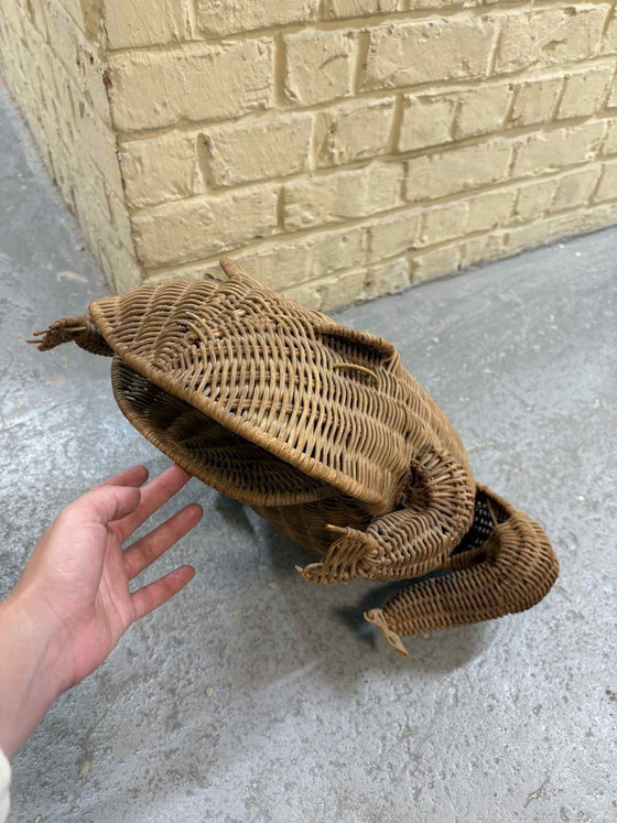 Image 1 of Vintage rattan newspaper rack with frog motif