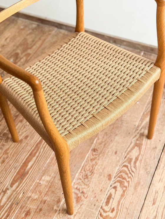 Image 1 of Esszimmerstuhl mit Armlehnen aus Eichenholz, Modell 62 für J.L. Moller