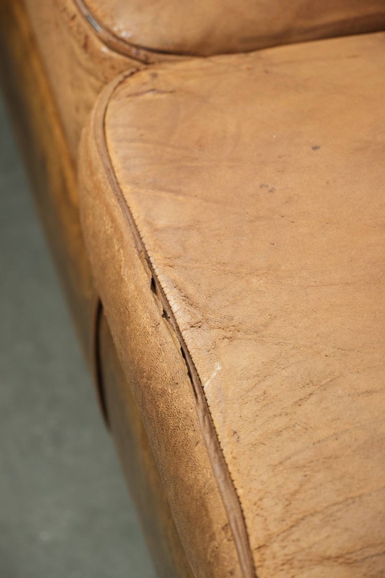 Image 1 of Karaktervolle schapenleren 2 zits bank met een mooie vintage look