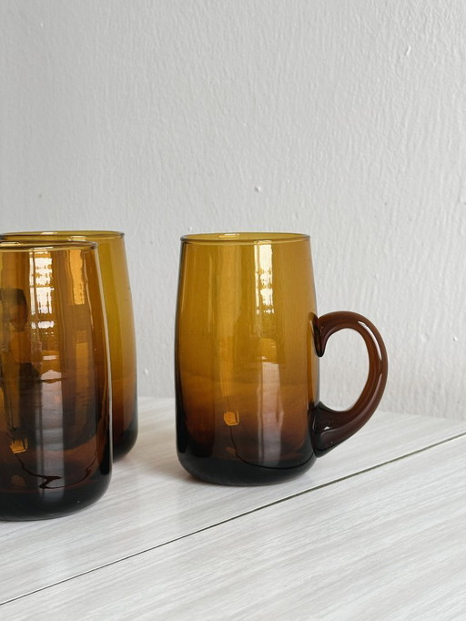 4 hand-blown amber glass mugs