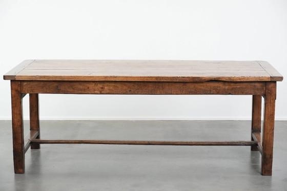 Image 1 of Table de salle à manger de ferme française ancienne et robuste, avec trois tiroirs, datant du XVIIIe siècle.