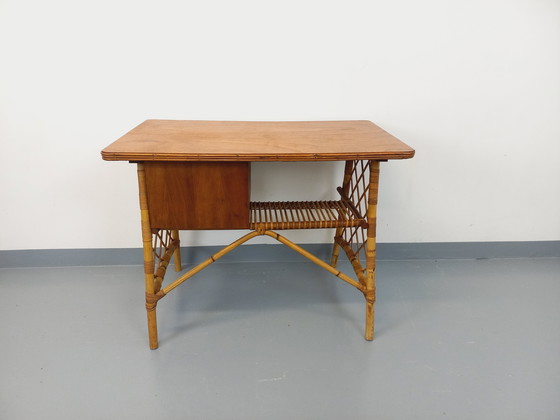 Image 1 of Vintage Louis Sognot bureau in rotan en hout uit de jaren 60
