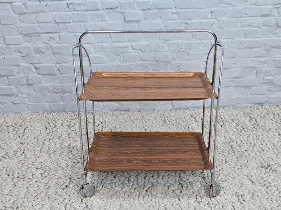Image 1 of Vintage Design Foldable and Mobile Chrome Steel 2 Faux Wood Layers ‘Dinett’ Serving Trolley by Gerlinol, Germany, 1970s. 