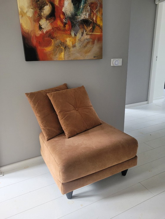 Image 1 of Two Leolux armchairs (Carabas model), one footstool, and three cushions. Upholstery: Alcantara.