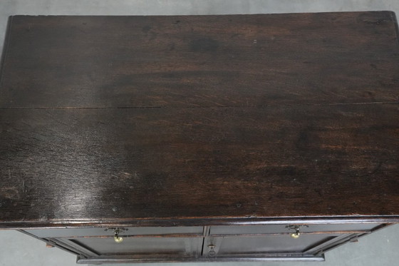 Image 1 of Rare English antique 2-door cabinet from the early 18th century with ball feet
