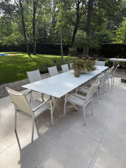 10 white textile garden chairs
