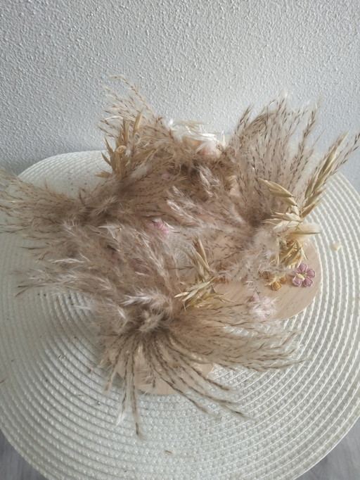 Kunstwerk eend en droogbloemen 