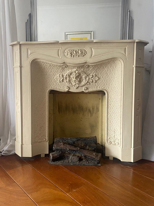 French Fireplace Of Cast Iron Color Ecru Powdered, Beautiful Relief Flower Vines.