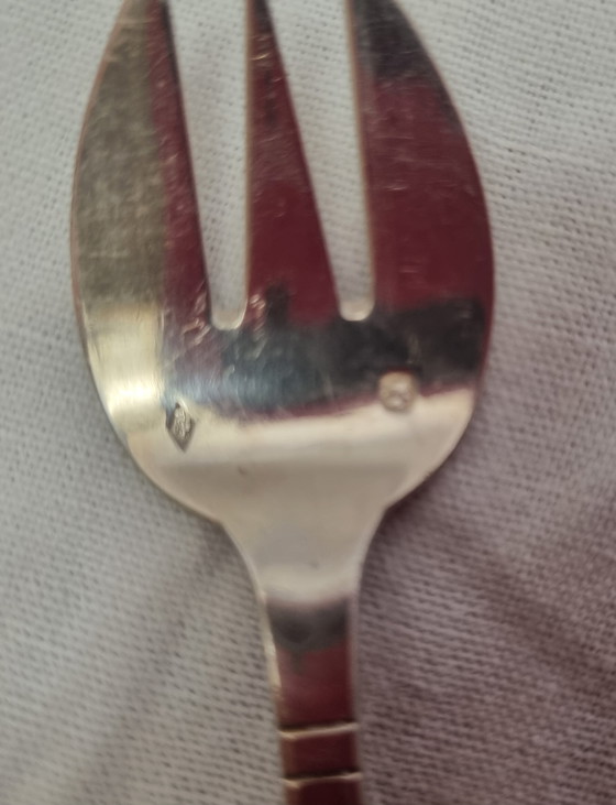 Image 1 of 4 fourchettes à huîtres argent massif minerve