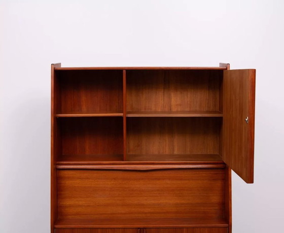 Image 1 of Deense teakhouten kast en schrijftafel/bar, van Arne Vodder, jaren 60.