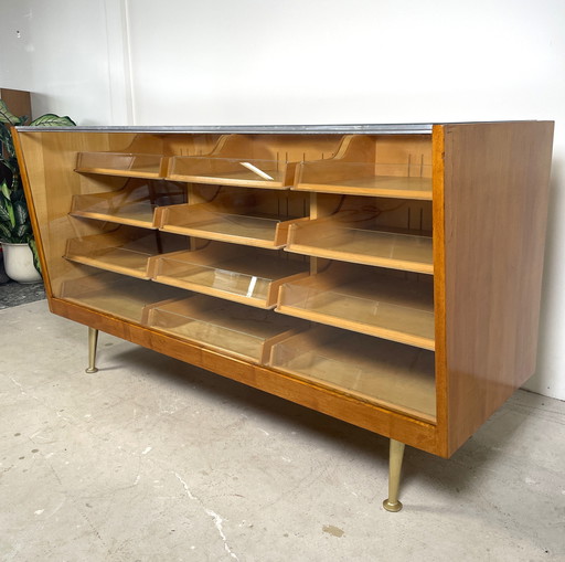 Vintage counter with drawers and glass top