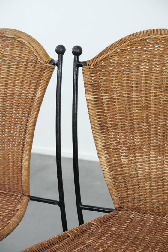 Image 1 of 2x Vintage design eetkamerstoelen van Frederick Weinberg met een gietijzeren frame