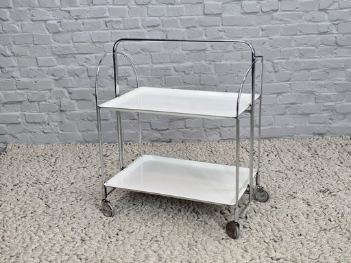 Vintage Foldable and Mobile Chrome Steel ‘Dinett’ Serving Trolley with 2 White Layers by Gerlinol, Germany, 1970s. 