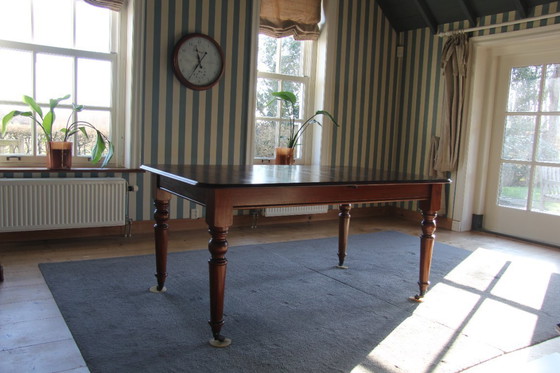 Image 1 of Victorian mahogany folding dining table by Eichholtz