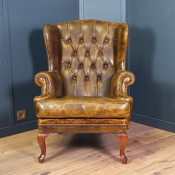 Image 1 of Cognac kleurige Vintage chesterfield fauteuil. 1 van 2